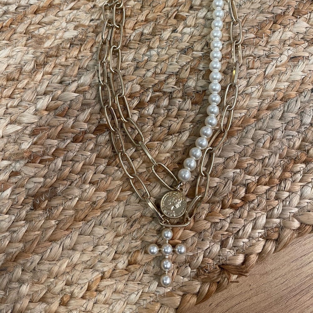 Gold layer cross necklace.